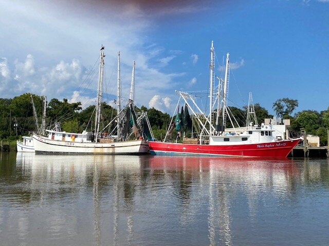 Boats docked on marina